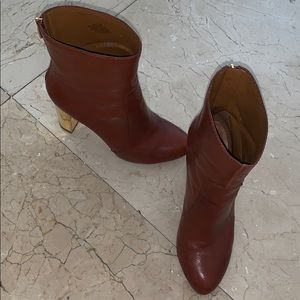 Leather boots with gold accent heel
